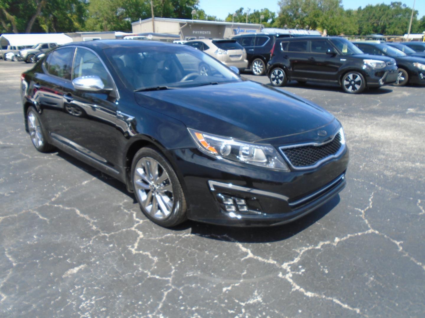 2014 Black /Grey Kia Optima SX Turbo (5XXGR4A68EG) with an 2.0L L4 DOHC 16V TURBO engine, 6-Speed Automatic transmission, located at 6112 N Florida Avenue, Tampa, FL, 33604, (888) 521-5131, 27.954929, -82.459534 - Photo#2